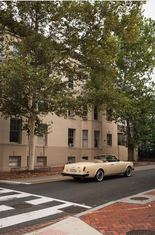 Vintage convertible driving through Georgetown, Washington, DC